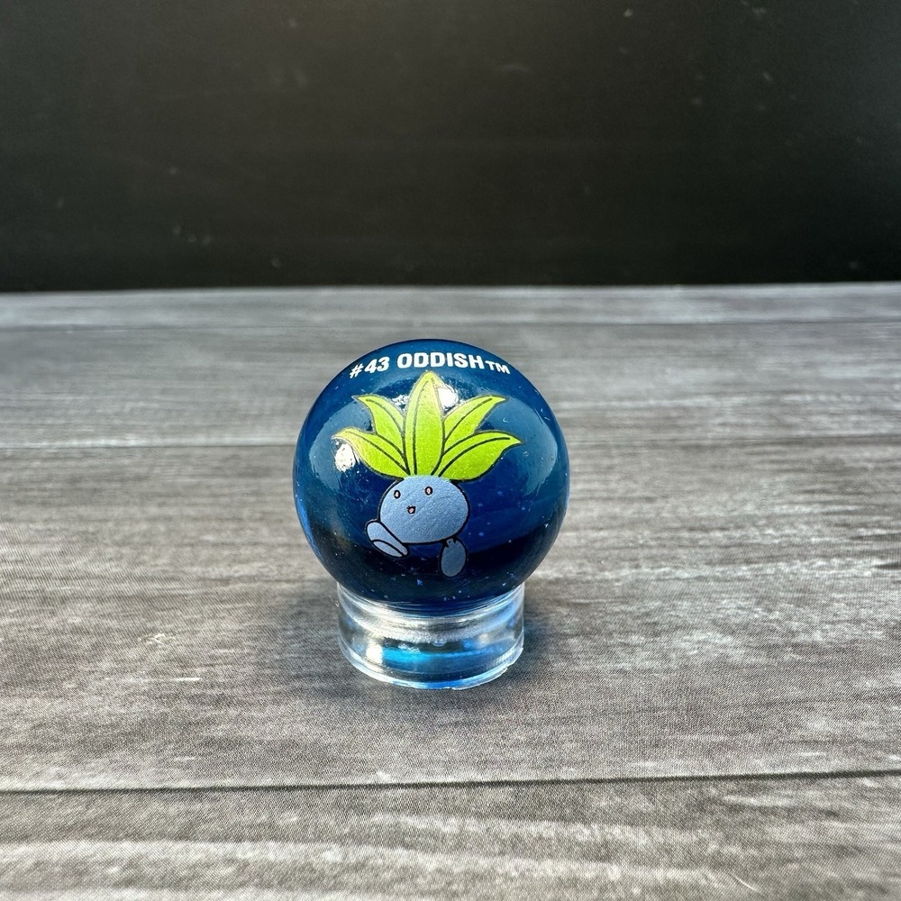 Vintage‎ ToyBiz Pokemon Marble Oddish #43 Glass Marble Clear Blue